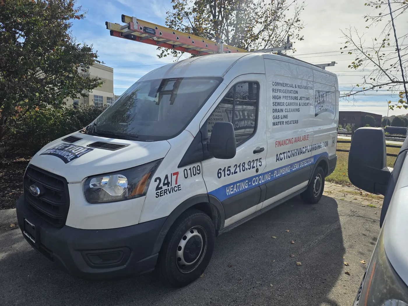 Action Mechanical service van with ladder rack, marked 24/7 service